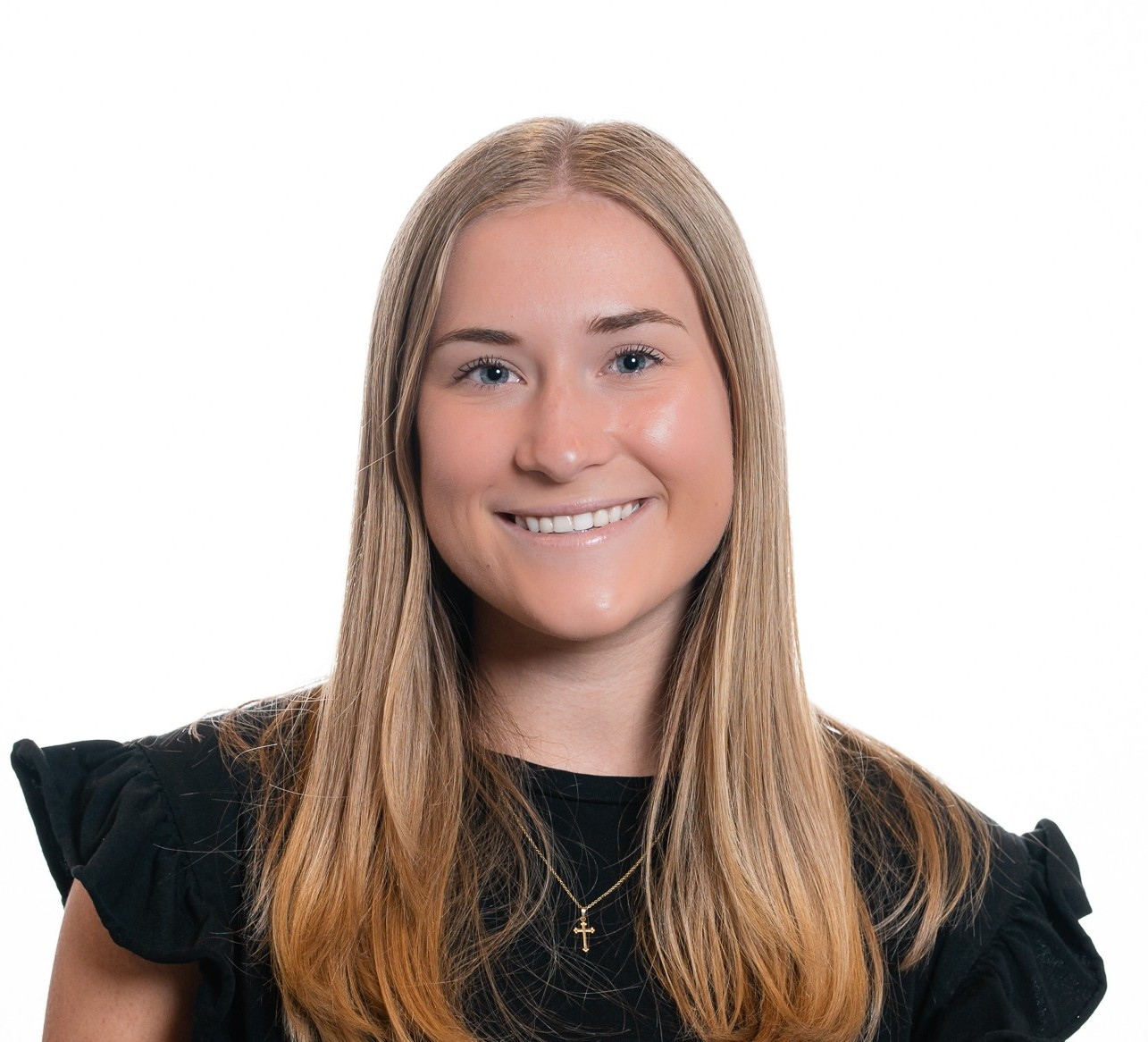 Karlie-Headshot2.webp